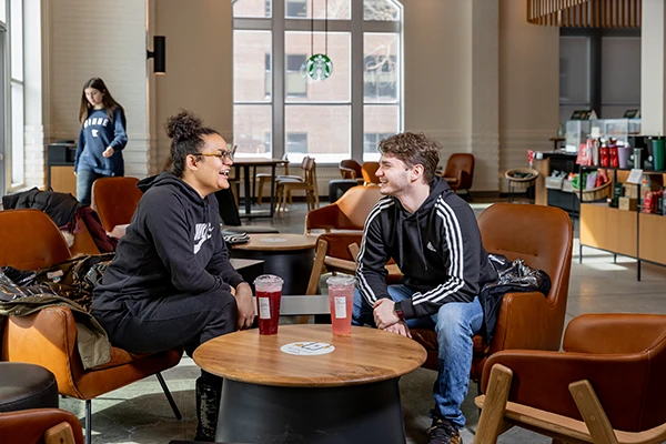 students visiting in Starbucks at the memorial union