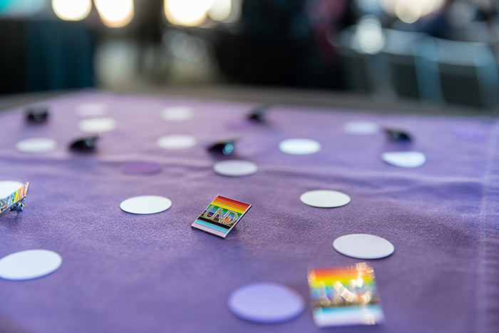 UND pride pins on table