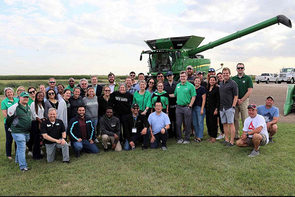 Staff members with combine