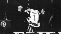 Ronald Reagan holds up UND hockey jersey on Oct 17, 1986