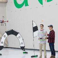 Small drone is being flown by aerospace students