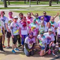 posing for a photo at the color run