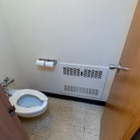 Toilet area in suite through door