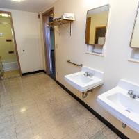Two sinks and toilet area in bathroom