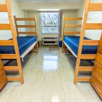Double bedroom in Selke hall with two beds, two closets, and two desks