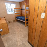 560 Carleton Court Bedroom with desk and dresser