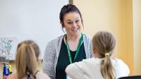 Student teacher in elementary classroom