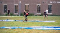 Students gather in Wilkerson Complex Quad outside of the Landing Zone for a game of Slip 'N Slide Kickball