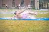 Students gather in Wilkerson Complex Quad outside of the Landing Zone for a game of Slip 'N Slide Kickball