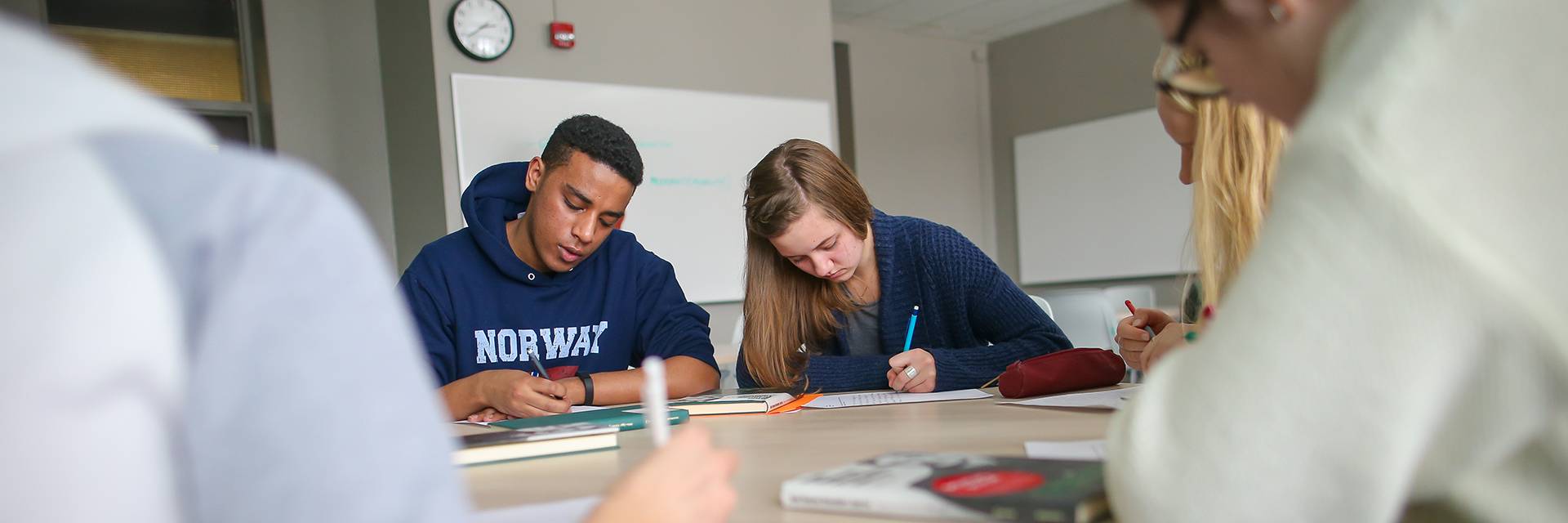 students studying at a table