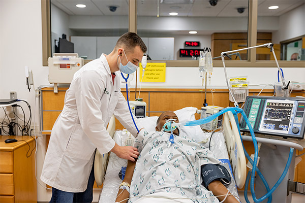 medical students using simulator