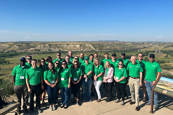 und employees on bus trip