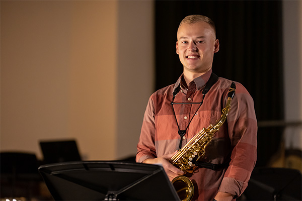 zachary fischer with saxophone