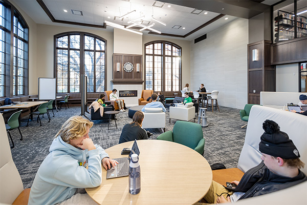 und students studying in library