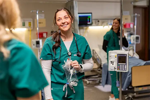 und nursing student working in hospital