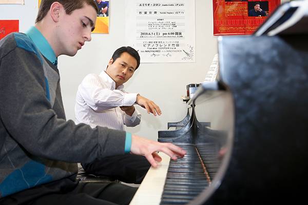 UND music student at the piano