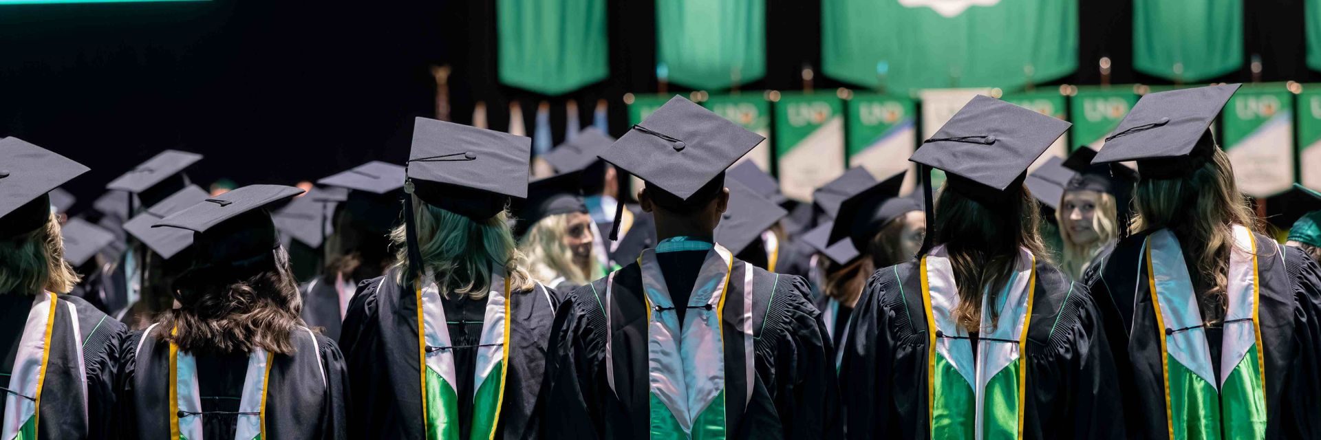 und graduates celebrate