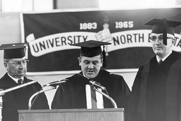 past und president clifford speaking at commencement ceremony