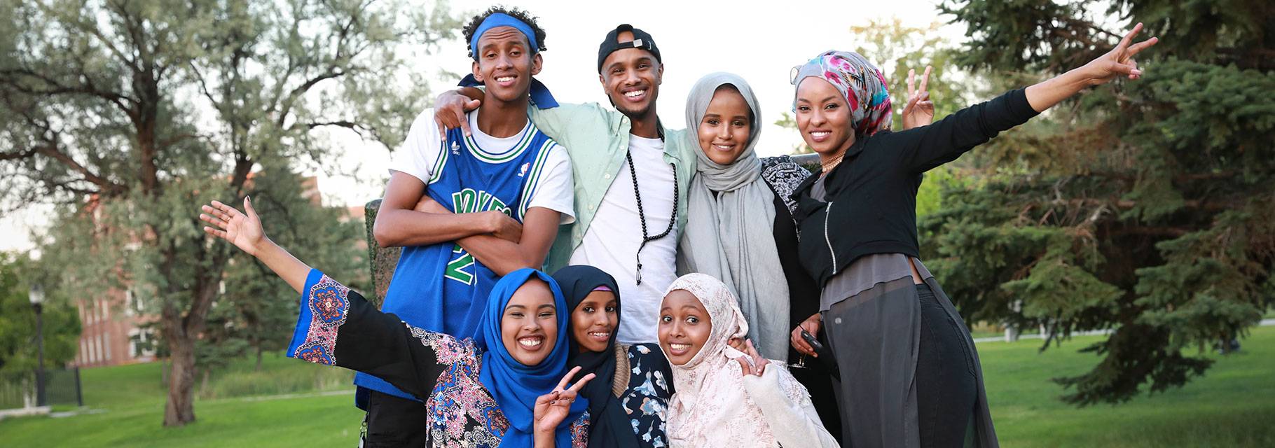 Students pose for a photo on campus