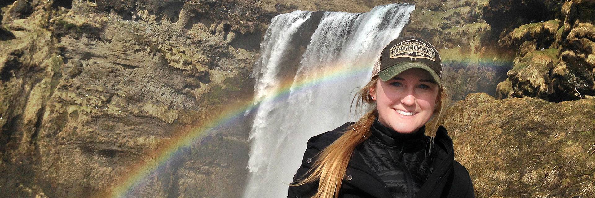 UND student at Iceland waterfall