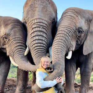 student with elephant