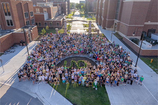 und students outdoors at welcome weekend