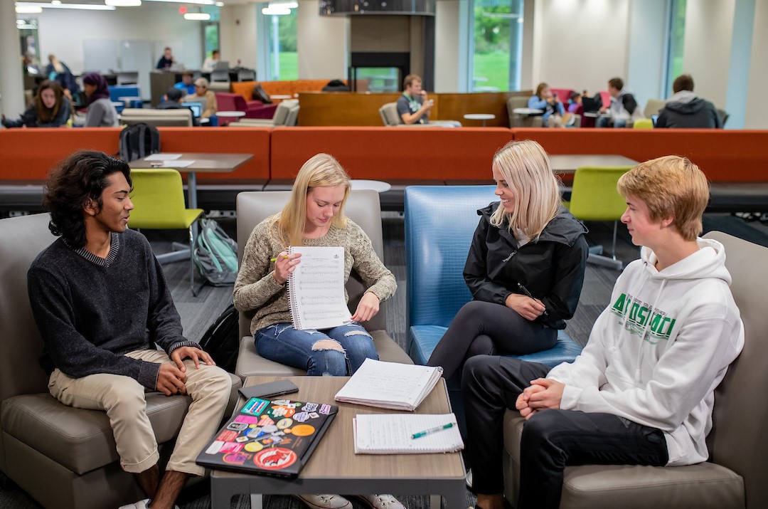 four students studying