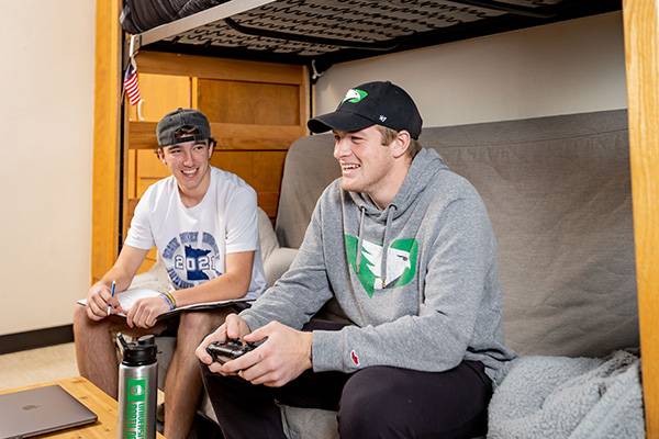 two freshman in dorm room