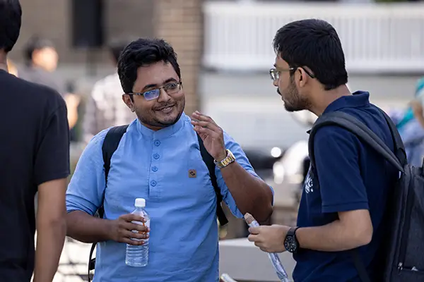 students on campus talking