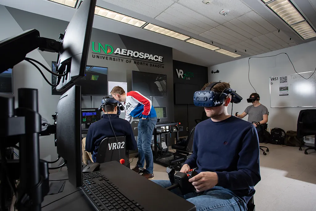 An aerospace student at UND fully engaged in the virtual experience