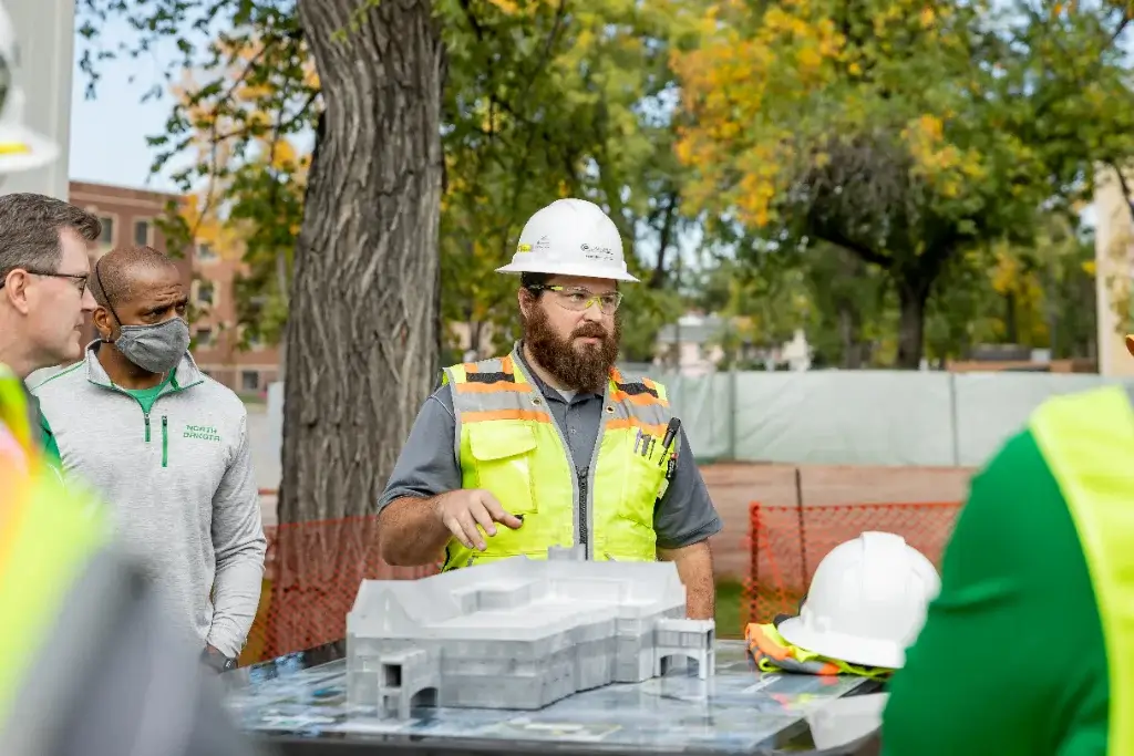 Civil engineering students working on a project at a worksite