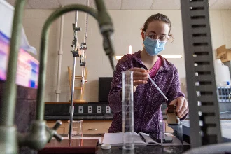 Student in a chemical engineering lab