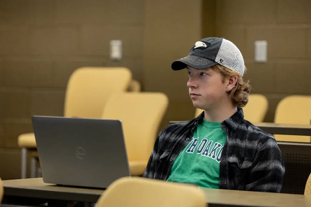 Criminal justice student, attentively listening to the lecture