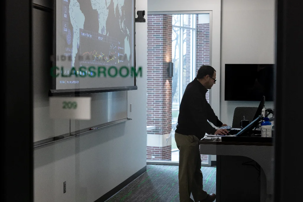 A political science professor is delivering a captivating lecture in a classroom.