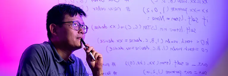 A student analyzing complex code and algorithms to understand the differences between Machine Learning vs. AI concepts.