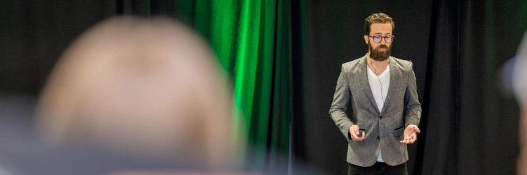 Faculty member presenting at pitch event