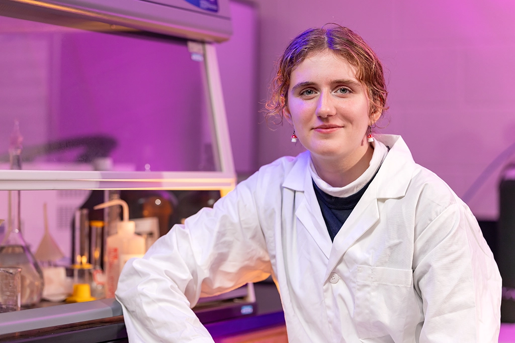 Elisabeth Starosta working in lab on UND campus