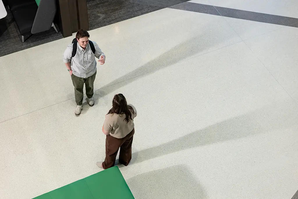 greyson examining a large drone