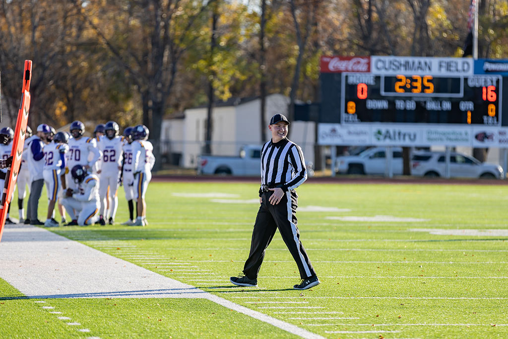 Kaden Kueneman working as football referee