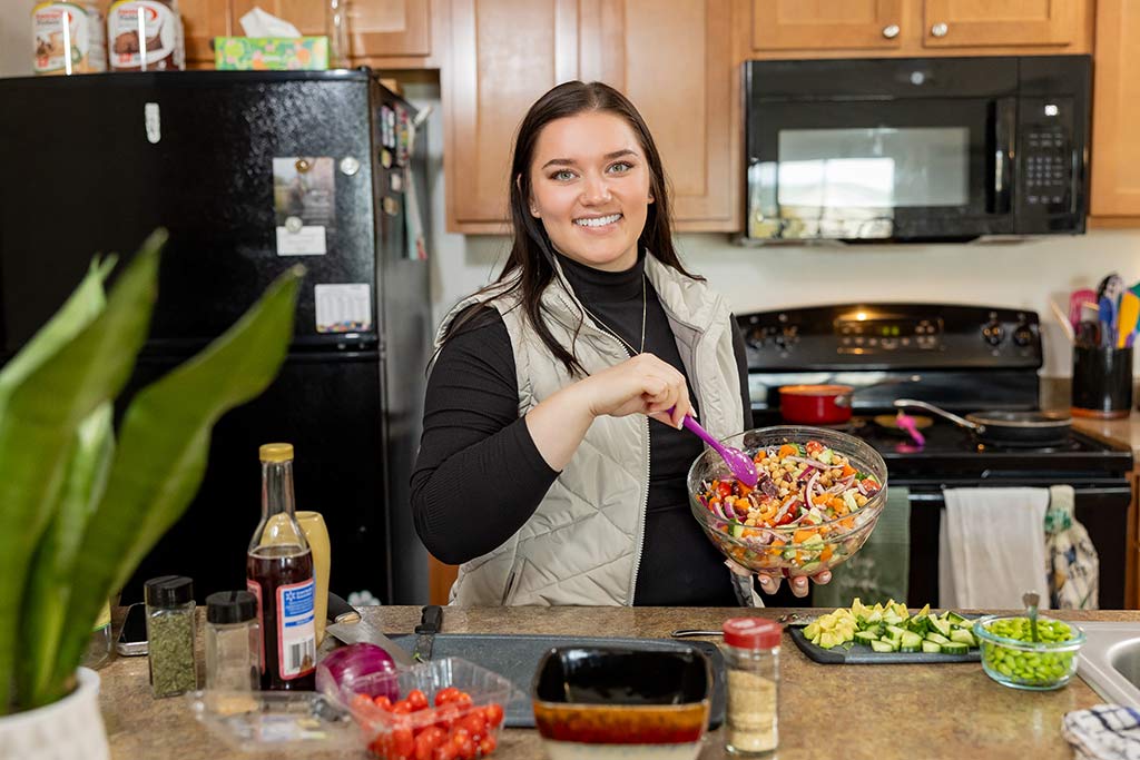 mckenzie working in the kitchen