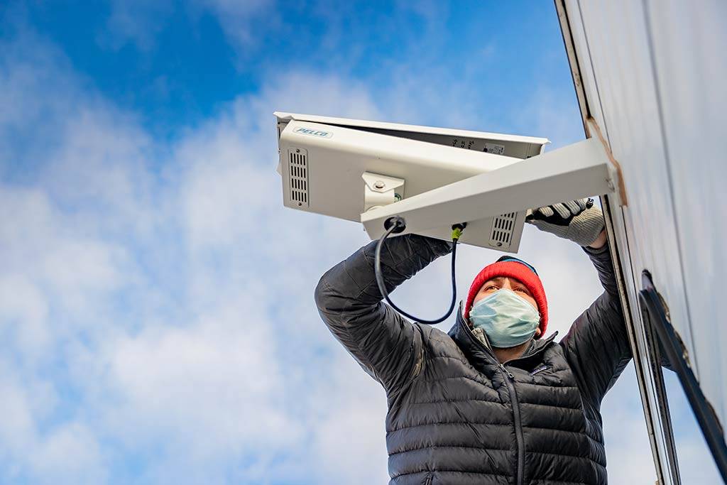 Vincent Ledvina installing an aurora camera.