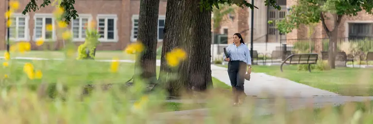UND Student Walking on Campus