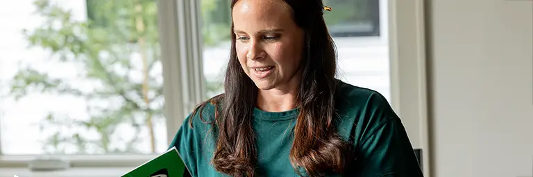 online MBA student at laptop