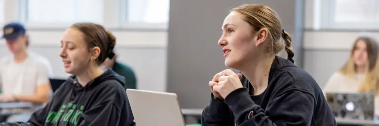 UND Female Communication Student in Classroom