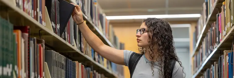 UND Student in Library