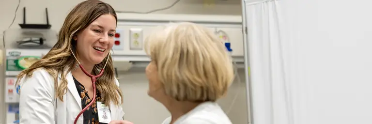 Graduate Nursing Student with Patient