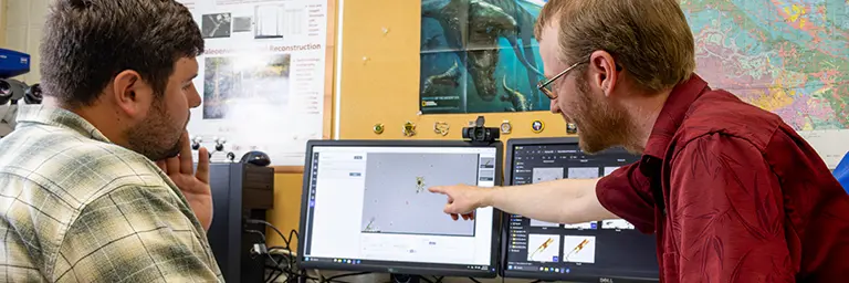 Geological Engineering Students Working on Computer