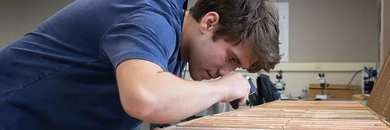 UND Student Working with Fossils