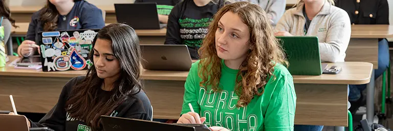 Human-Technology Interaction student working on a computer system