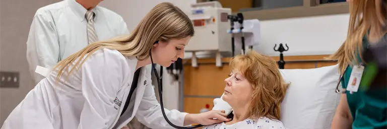 UND Medical Student with Patient